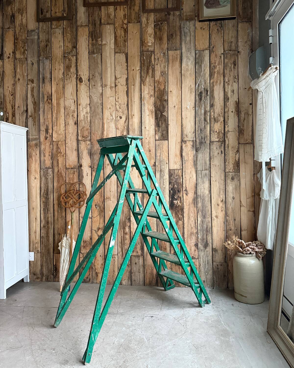 Vintage stepladder with green patina