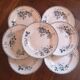 Lot de 7 assiettes plates.
