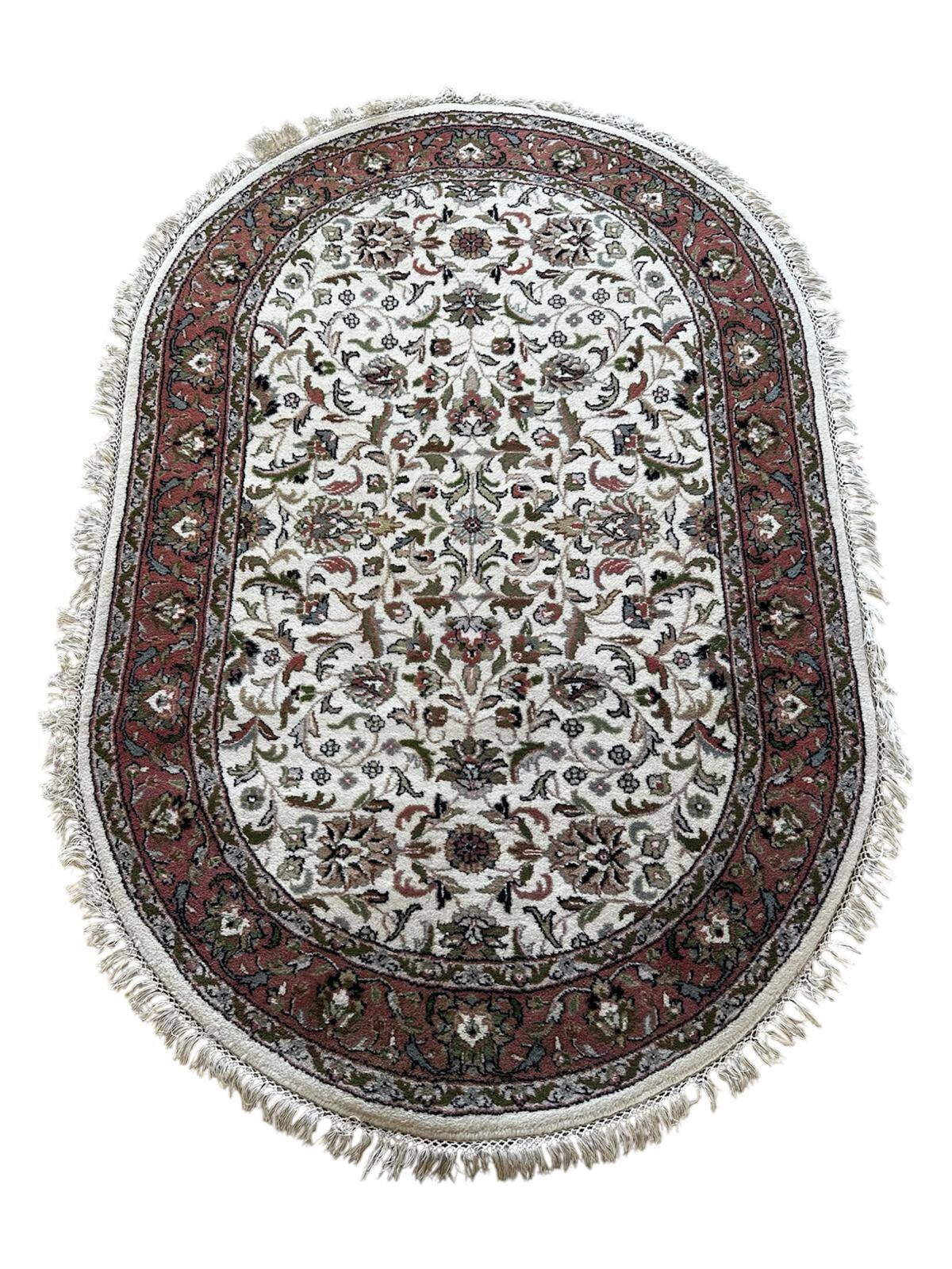 Handmade oval Persian rug 185cm x 120cm