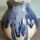 Blue and green glazed ceramic ribbed pitcher