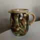 Glazed earthenware jug mixed clays Provence 1960