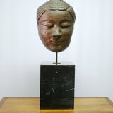 Buddha head sculpture, marble base