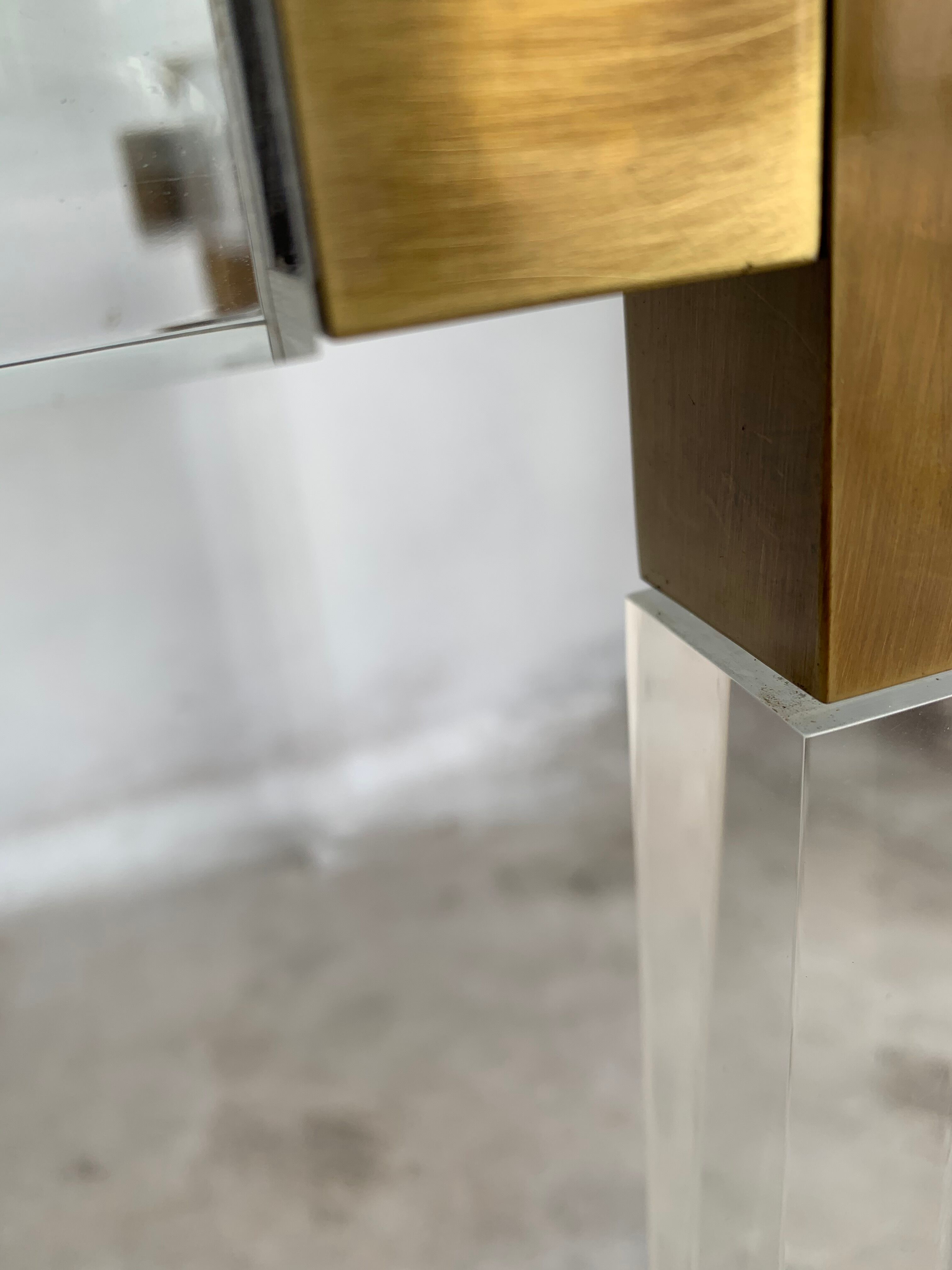 Lucite and brass coffee table by Charles Hollis Jones