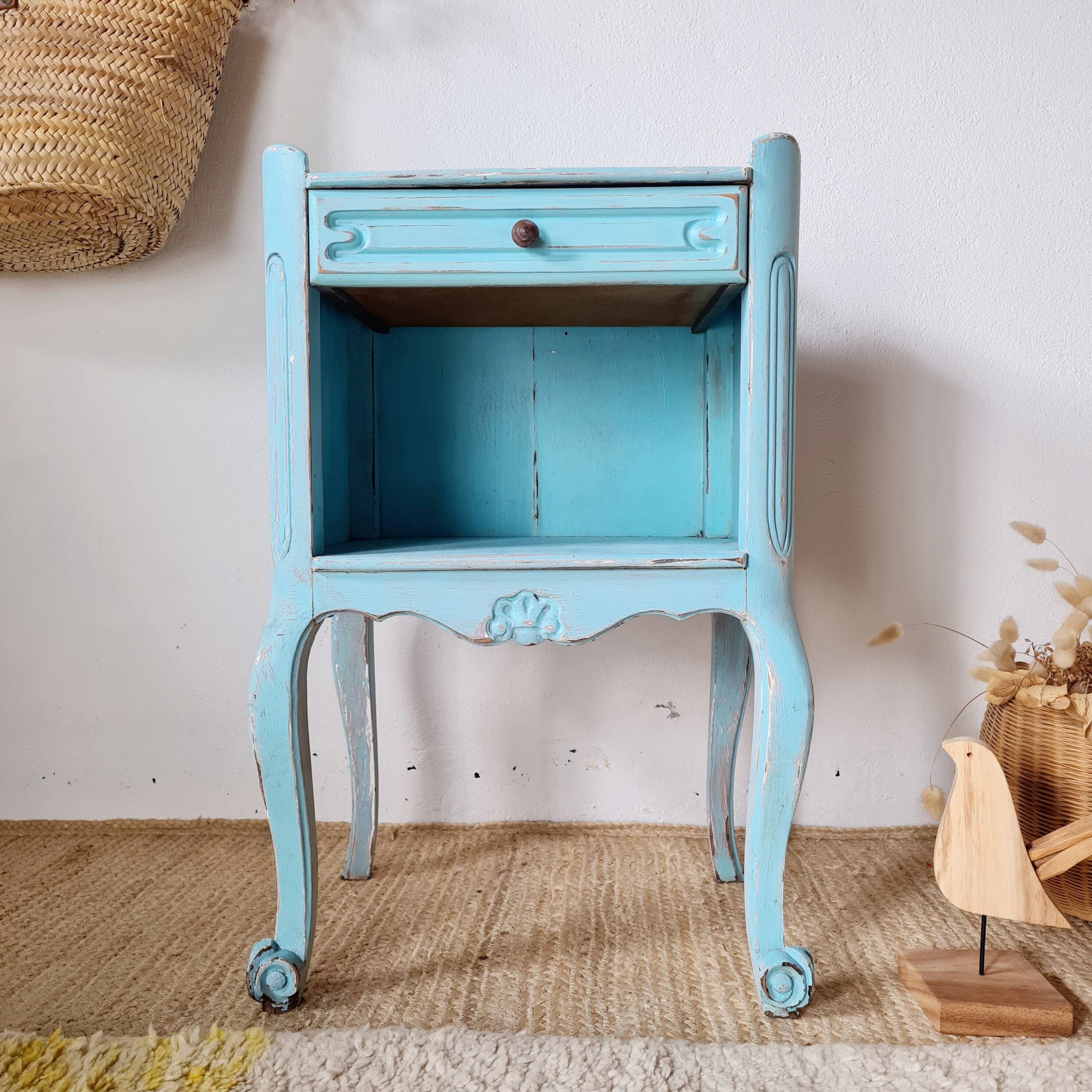 Small vintage bedside table in azure blue patina.