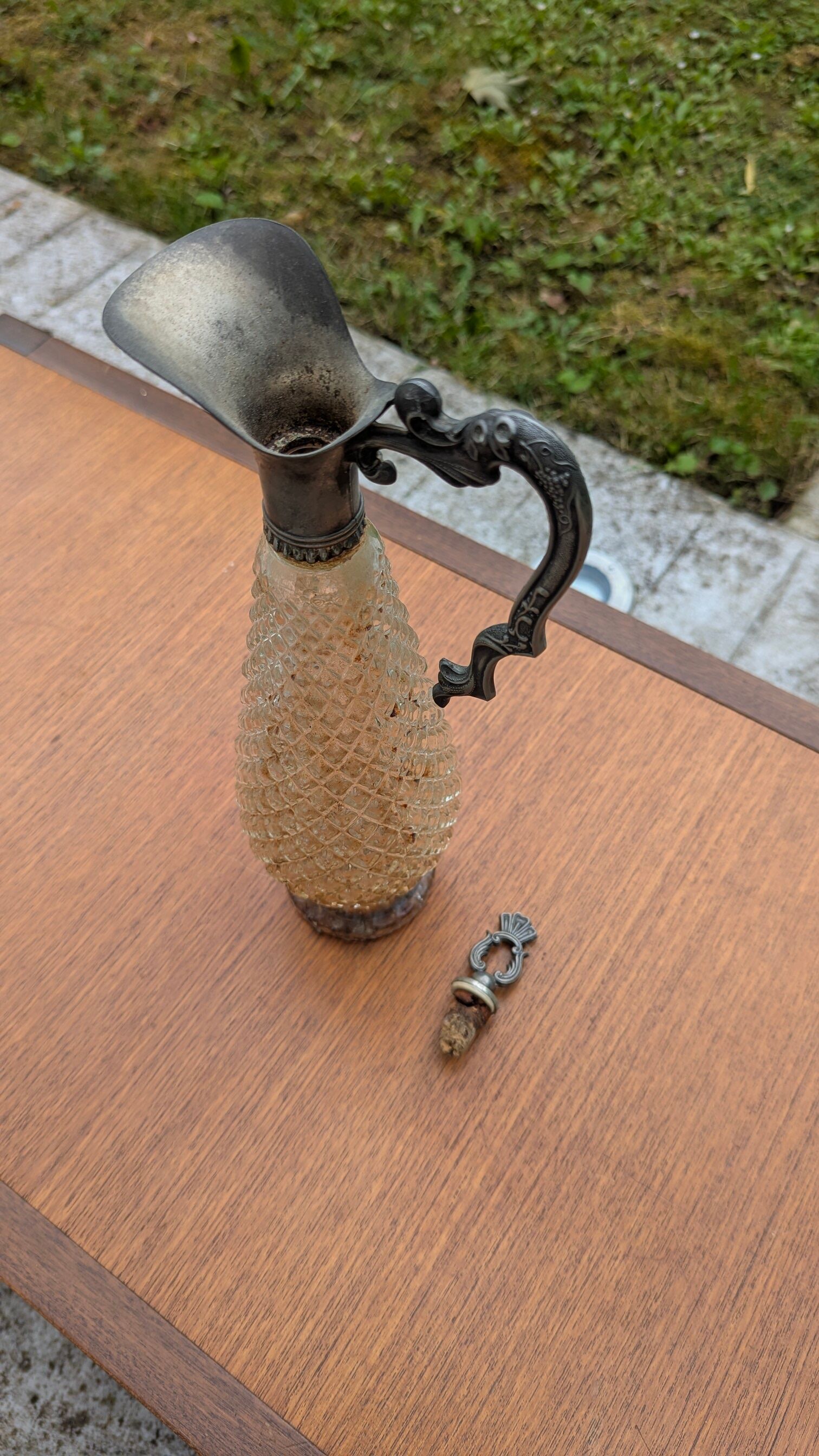 Old small carafe / liqueur jug in cut glass and silver metal.