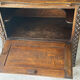 Small storage cabinet in carved oak – circa 1930