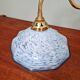 Brass and blue speckled glass wall light