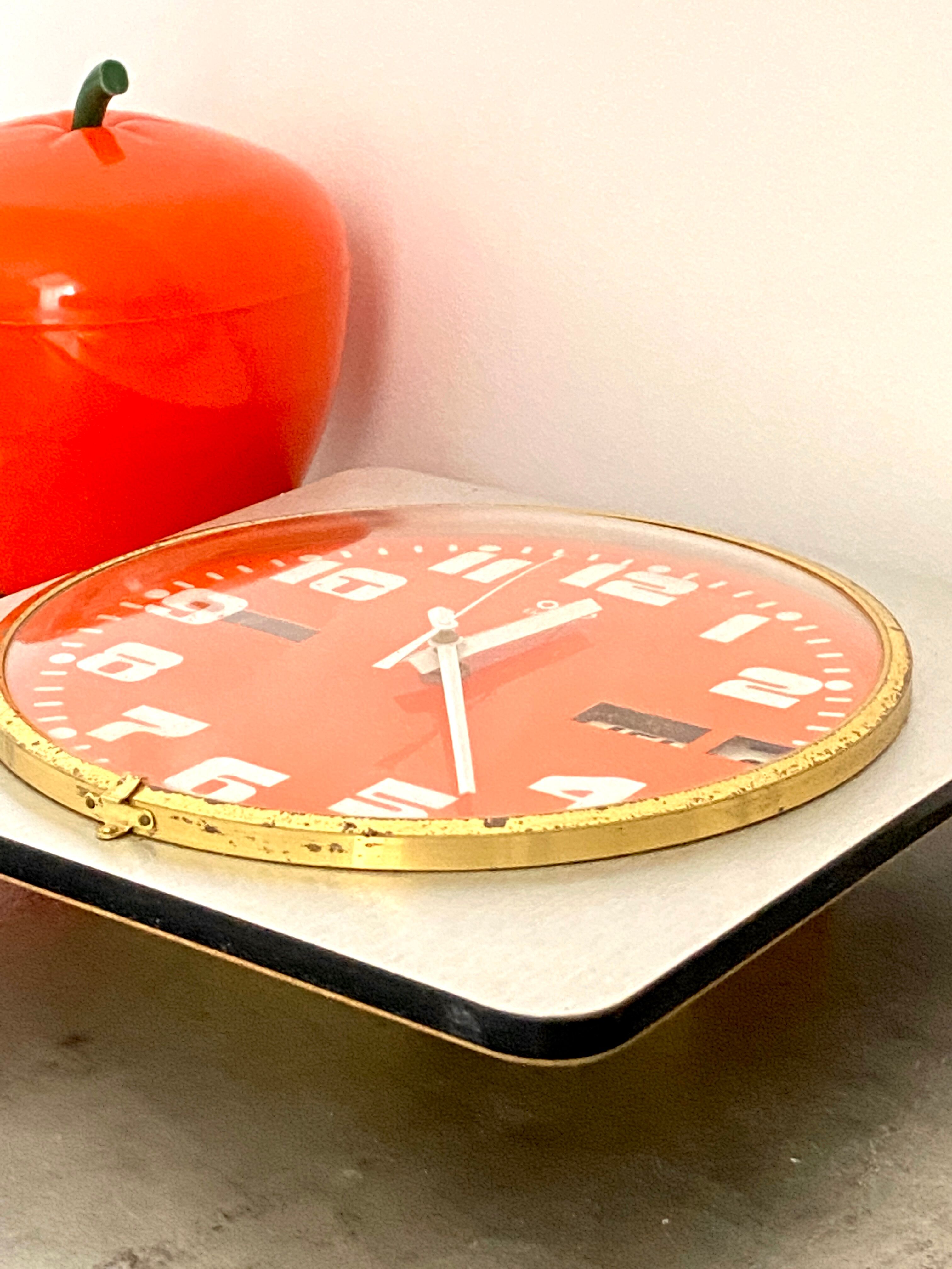 Vintage orange wall clock