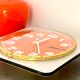 Vintage orange wall clock