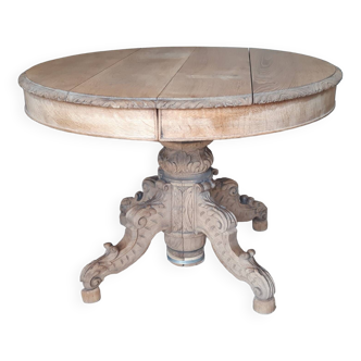 Oval wooden table with extensions