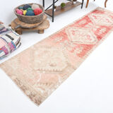 Faded red and beige vintage runner rug 322x85cm