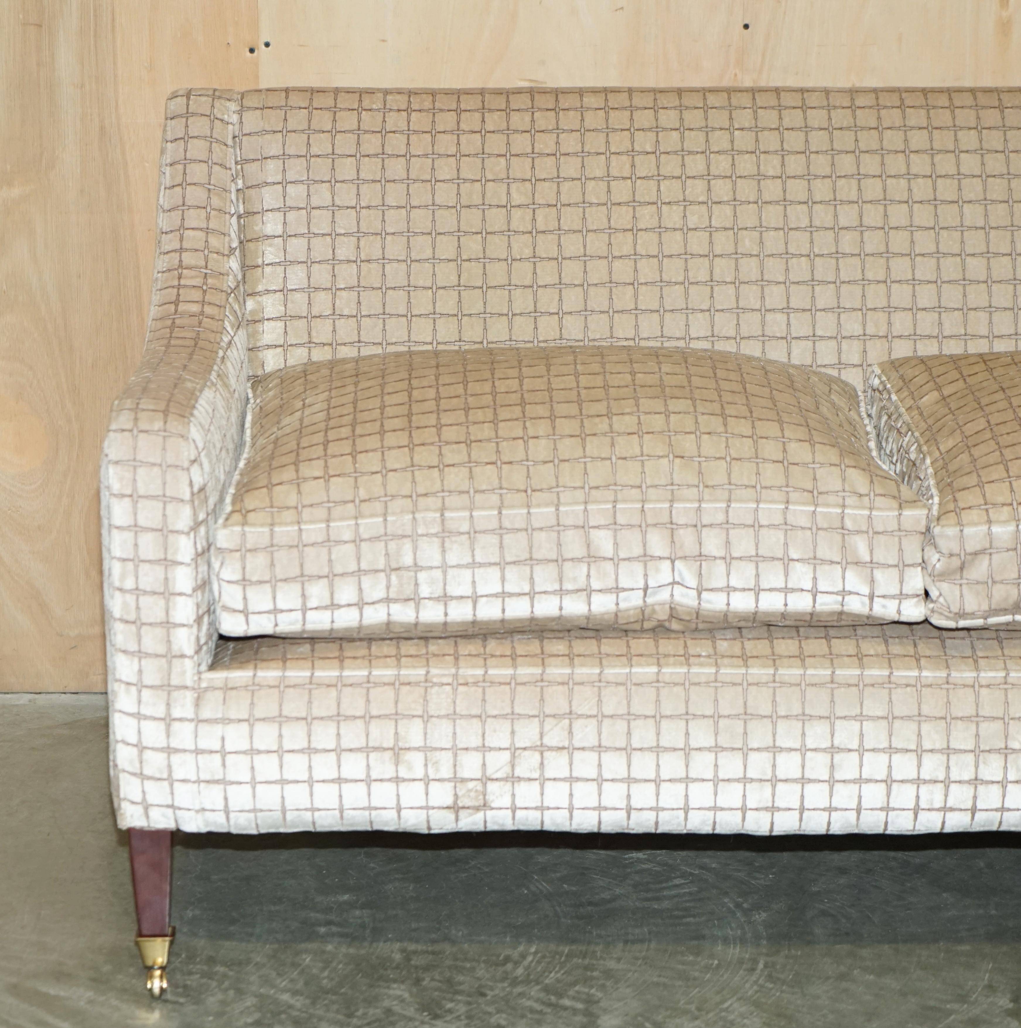 Fabric sofa and footstool, handmade in England.