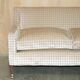 Fabric sofa and footstool, handmade in England.