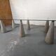 Glass table with cement legs