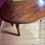 Old oval table with 2 swings