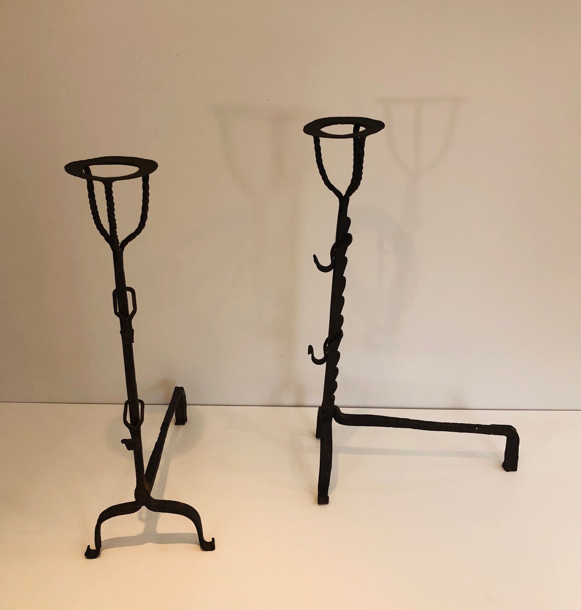 Pair of wrought iron landiers. french work ,seventeenth century