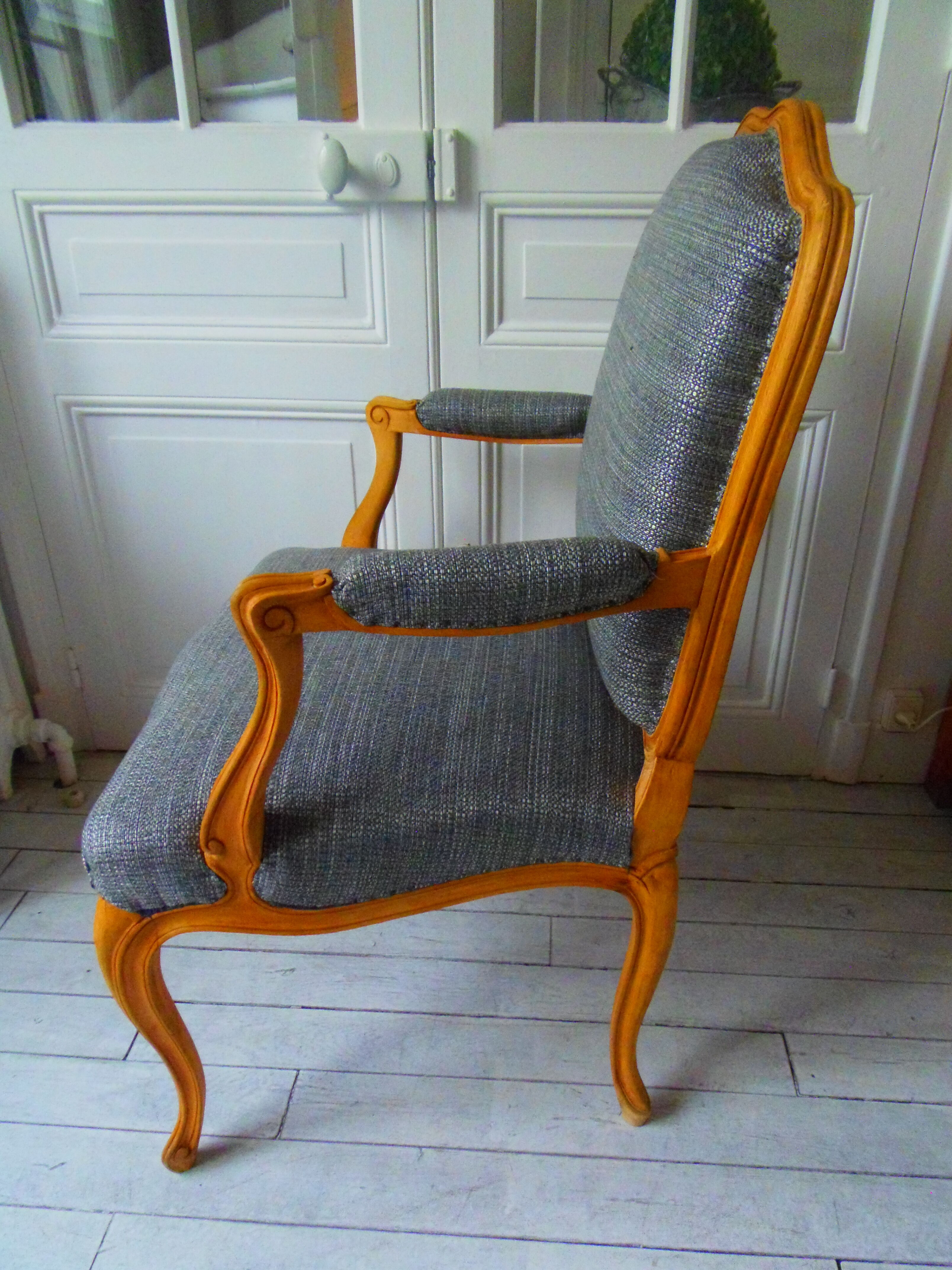 Louis XV style chair trim lined with a mottled grey wool, medium oak waxed finish
