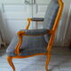 Louis XV style chair trim lined with a mottled grey wool, medium oak waxed finish