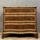 Louis XV style curved chest of drawers in rosewood and rosewood marquetry