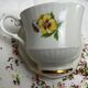 Antique porcelain cup and sub-cup