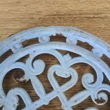 Dessous de plat en fonte