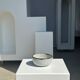 Small white glazed ceramic bowl black edges