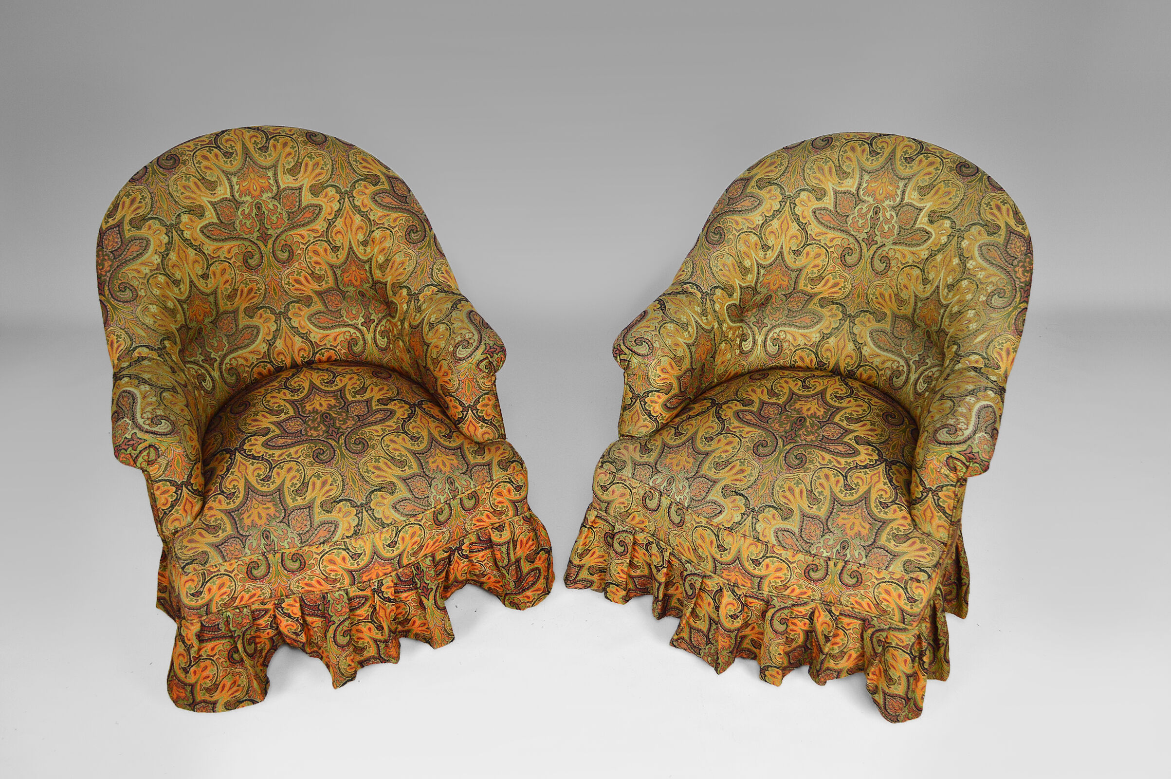 Pair of toad chairs, paisley fabric