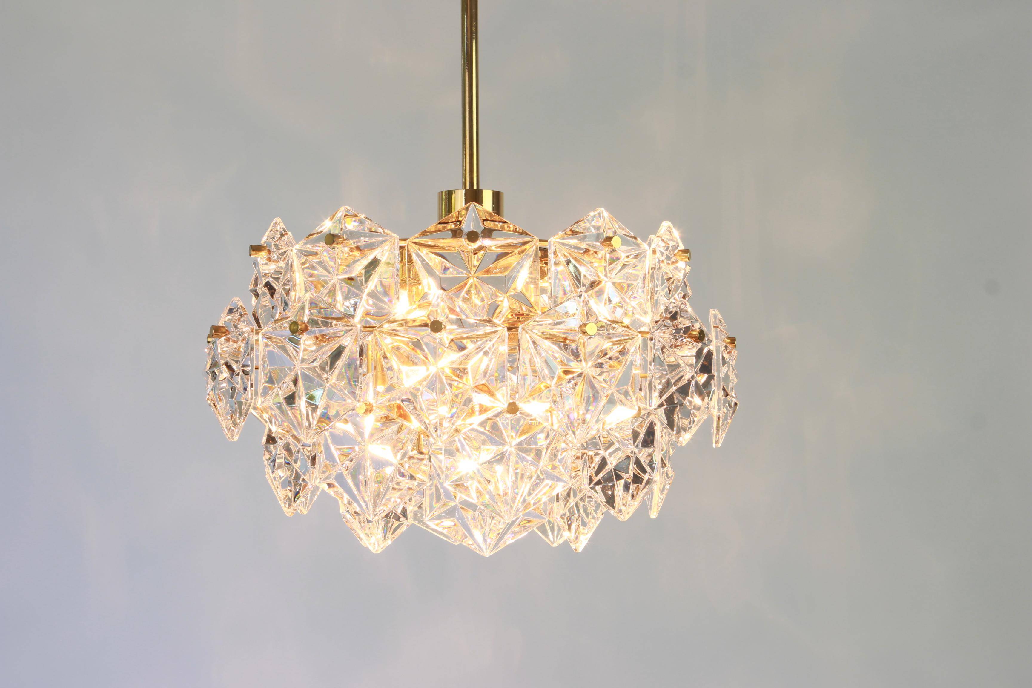Magnificent chandelier, brass and crystal glass by Kinkeldey, Germany, 1970.