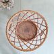 Old tripod rattan plant holder