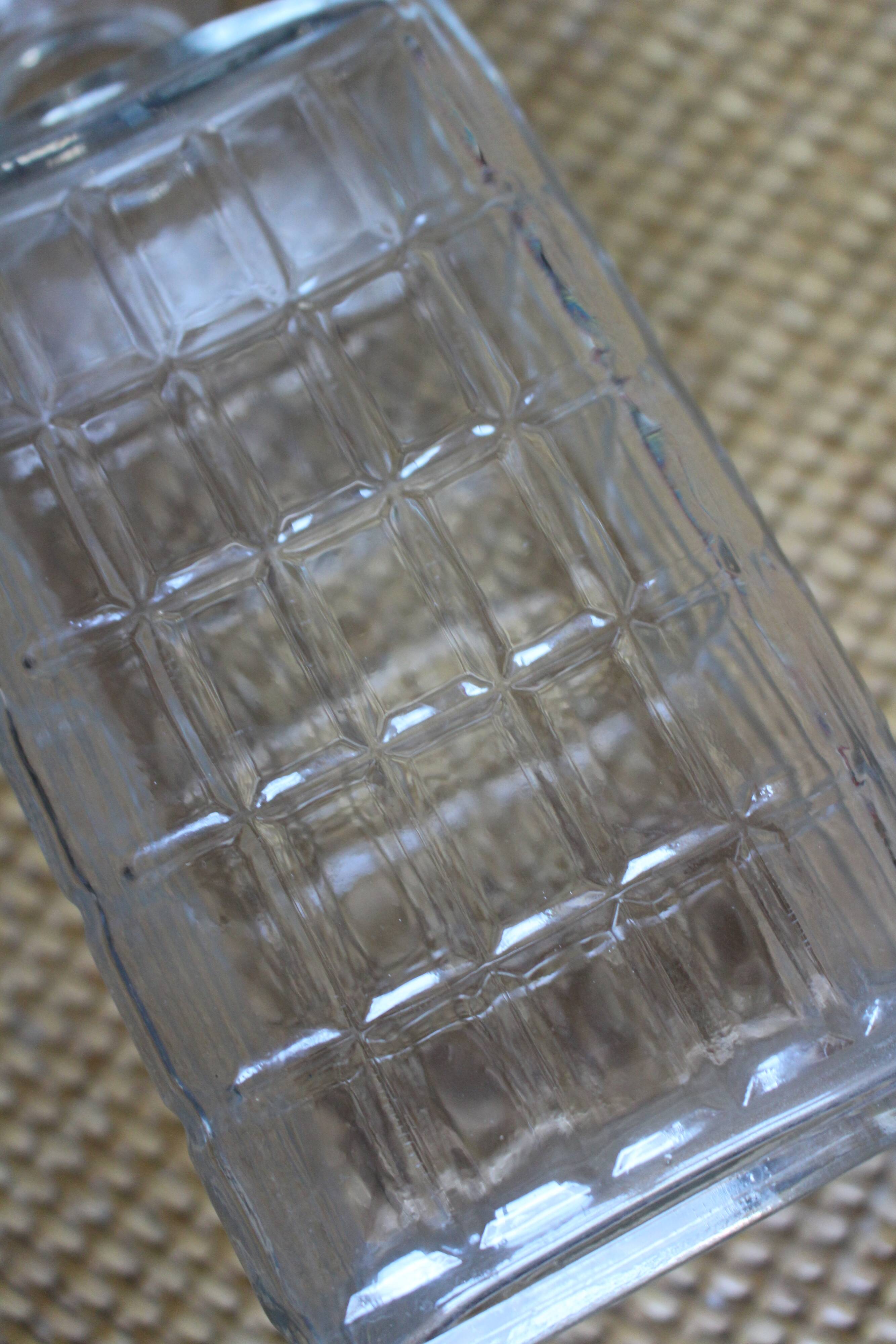Vintage glass water carafe with rectangular vase.