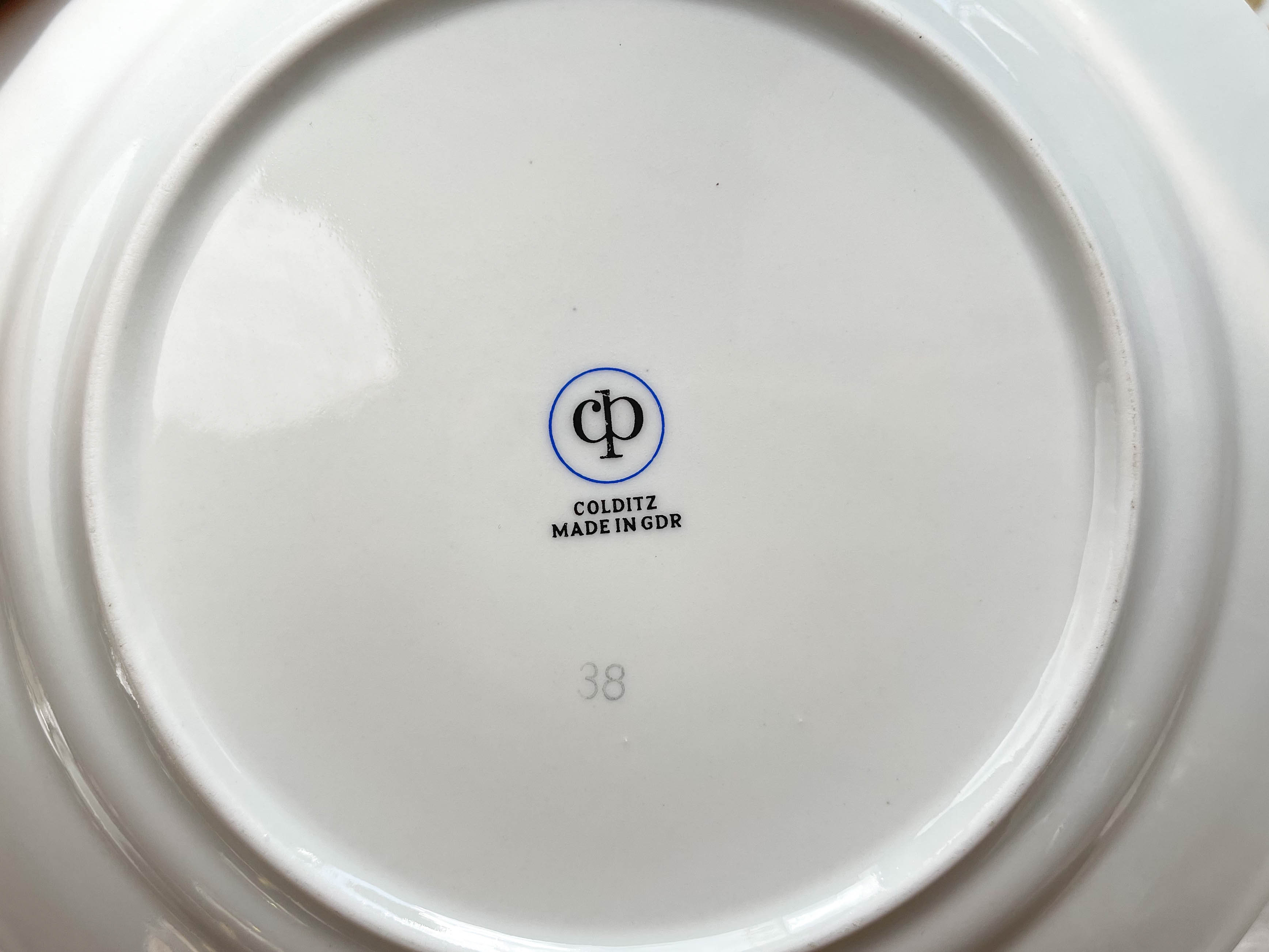 12 Mismatched porcelain plates