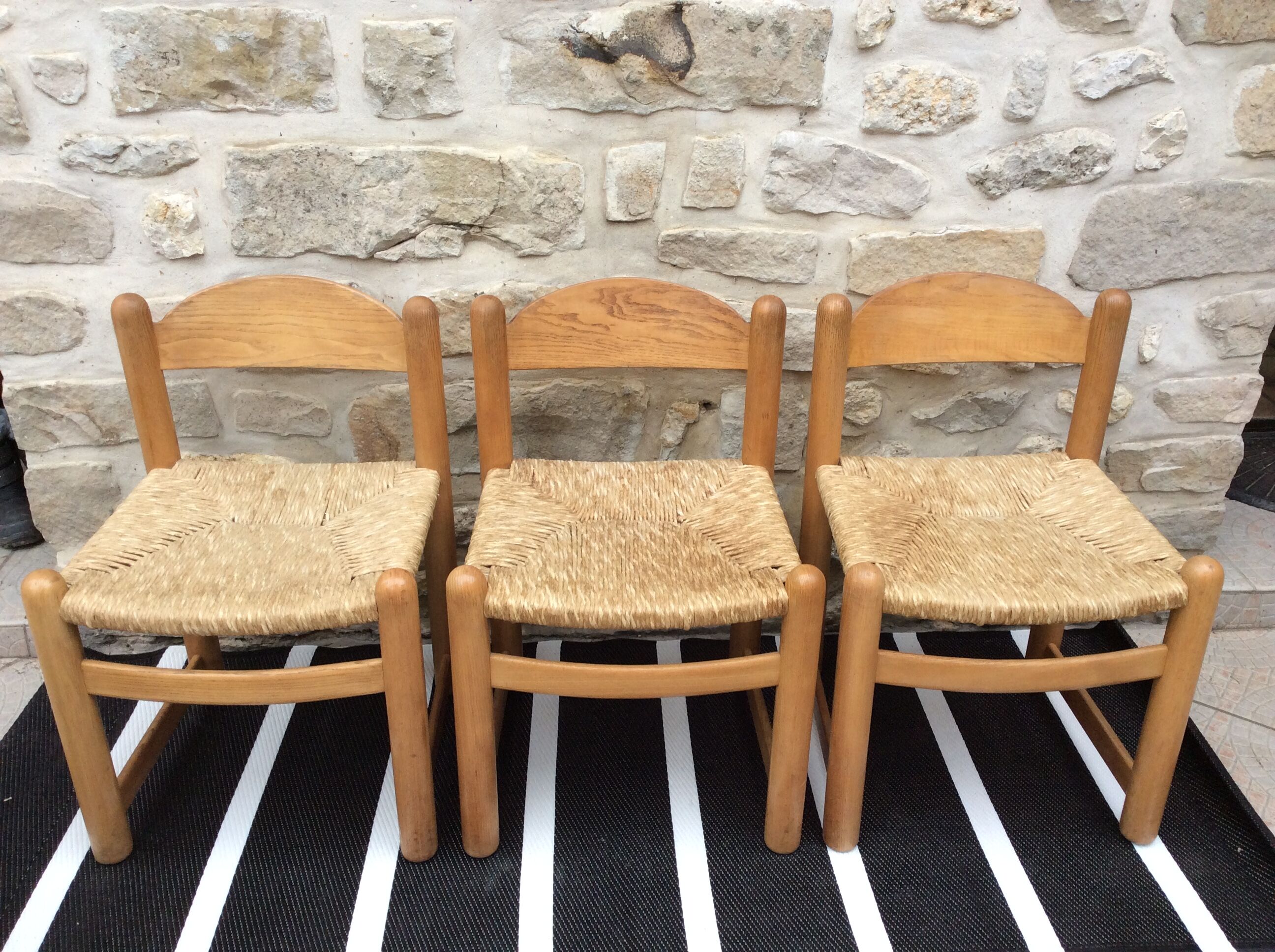 Straw seated wooden chairs
