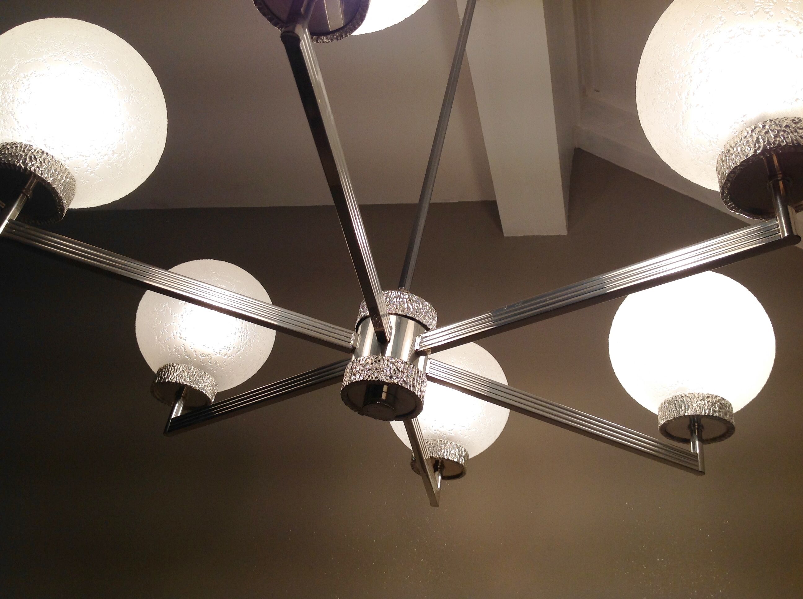 Six-light chrome metal chandelier and opaque glass globes / vintage 60s and 70s