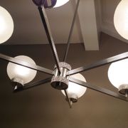 Six-light chrome metal chandelier and opaque glass globes / vintage 60s and 70s