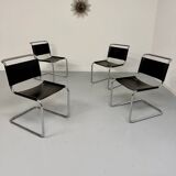 Lot of 4 tubular chairs designed by Mart Stam in vintage black leather from the 1980s.