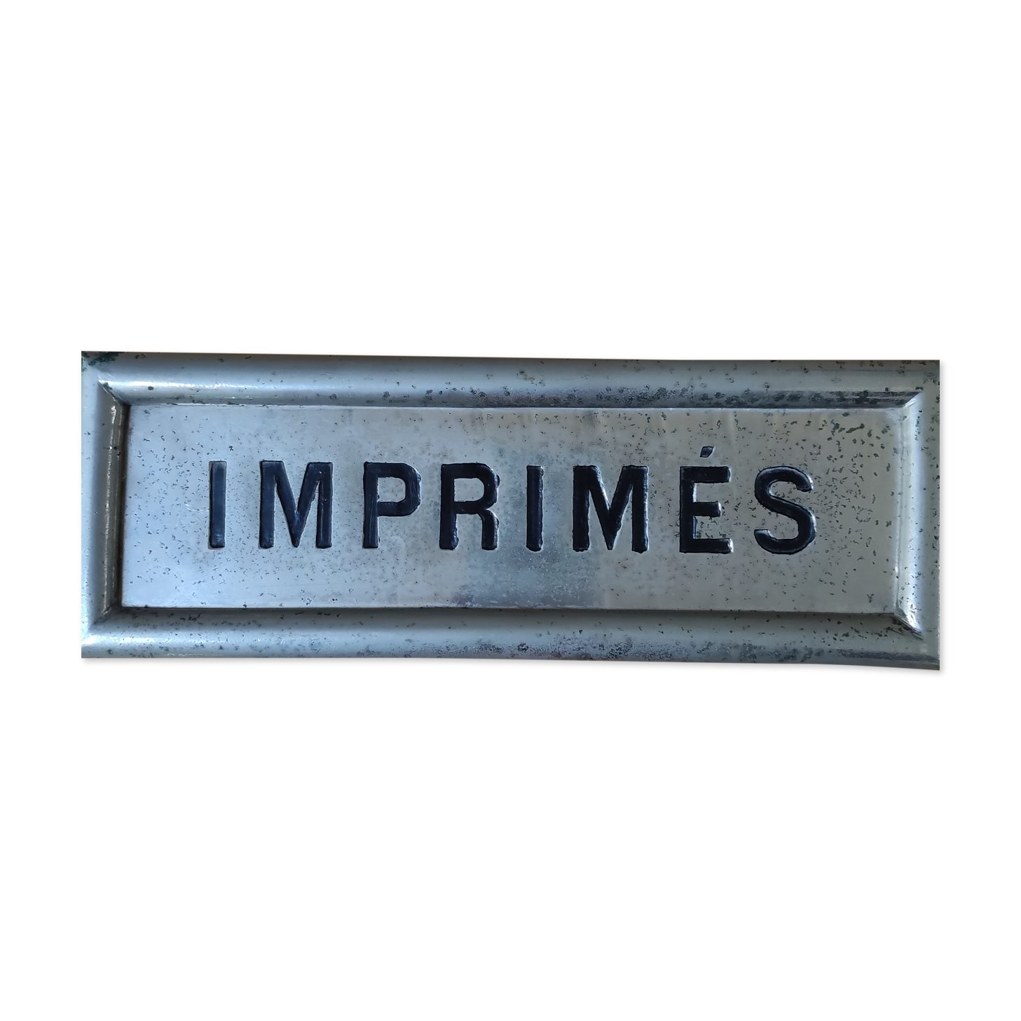 Sign "Printed"old. Silver metal.