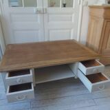 Coffee table on casters, made from an old desk, pearl gray base and belt.