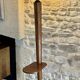 Art Deco modernist floor lamp in walnut and opaline globe, 1930s.