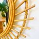 Vintage sun mirror in rattan – 60s/70s