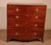 bombé commode from the Regency period circa 1800 with inlays