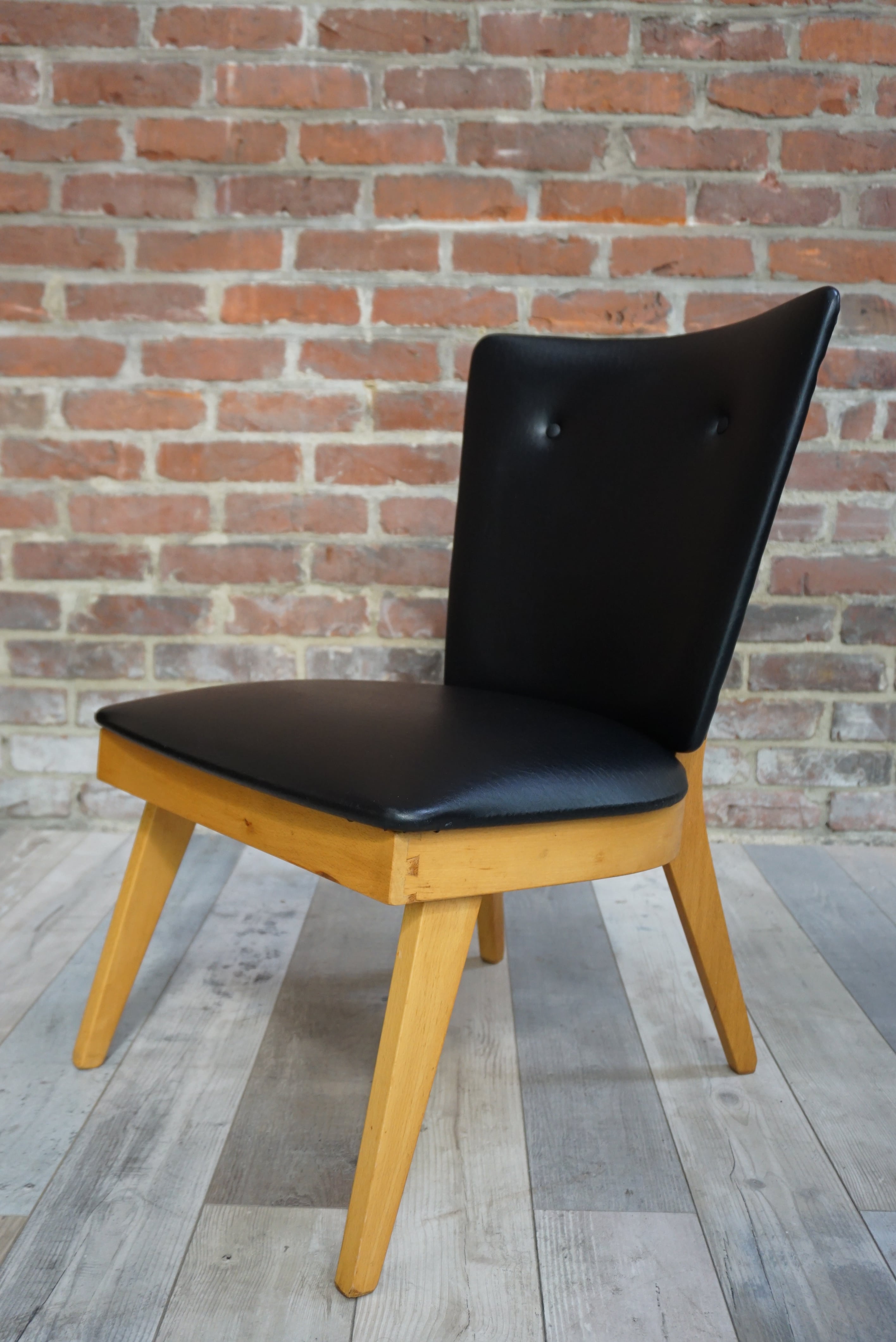 Chair 50 years in wood and faux black leather cocktail