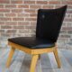 Chair 50 years in wood and faux black leather cocktail