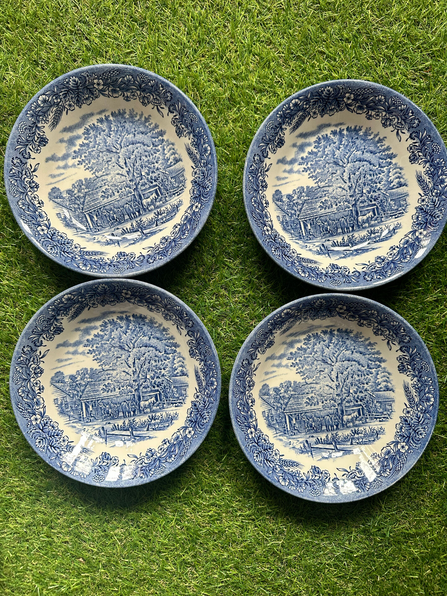Set of 4 English deep plates by Churchill.