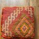 Moroccan Berber pouf colorful terracotta orange and bohemian green