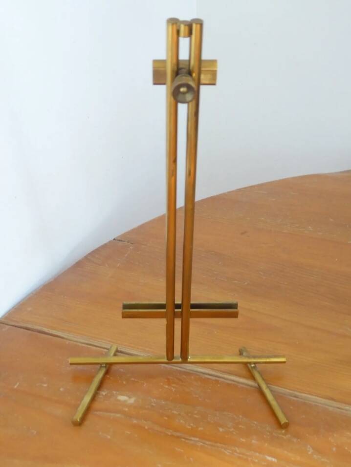 Table mirror on a brass easel