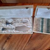 cutlery and spoons with ice and silver metal cake