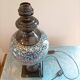 Large ceramic lamp base in blue, gold and black