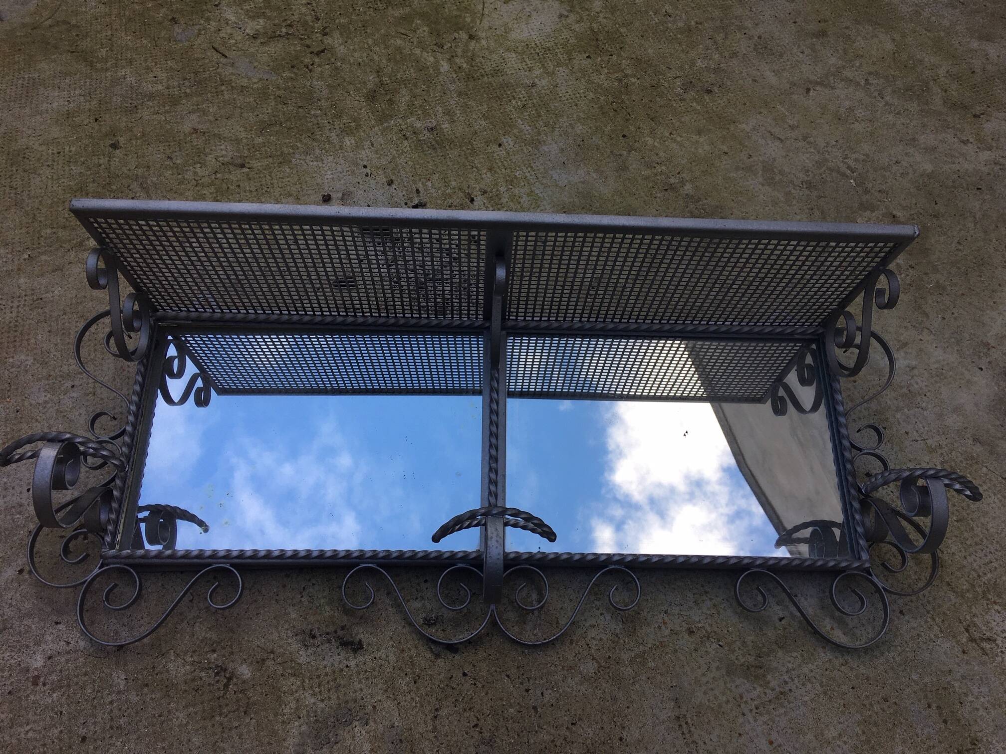 Wall coat rack, wrought iron hook with vintage mirror.