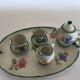Small antique tea set in porcelain for children.