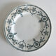 4 mismatched iron earth dessert plates